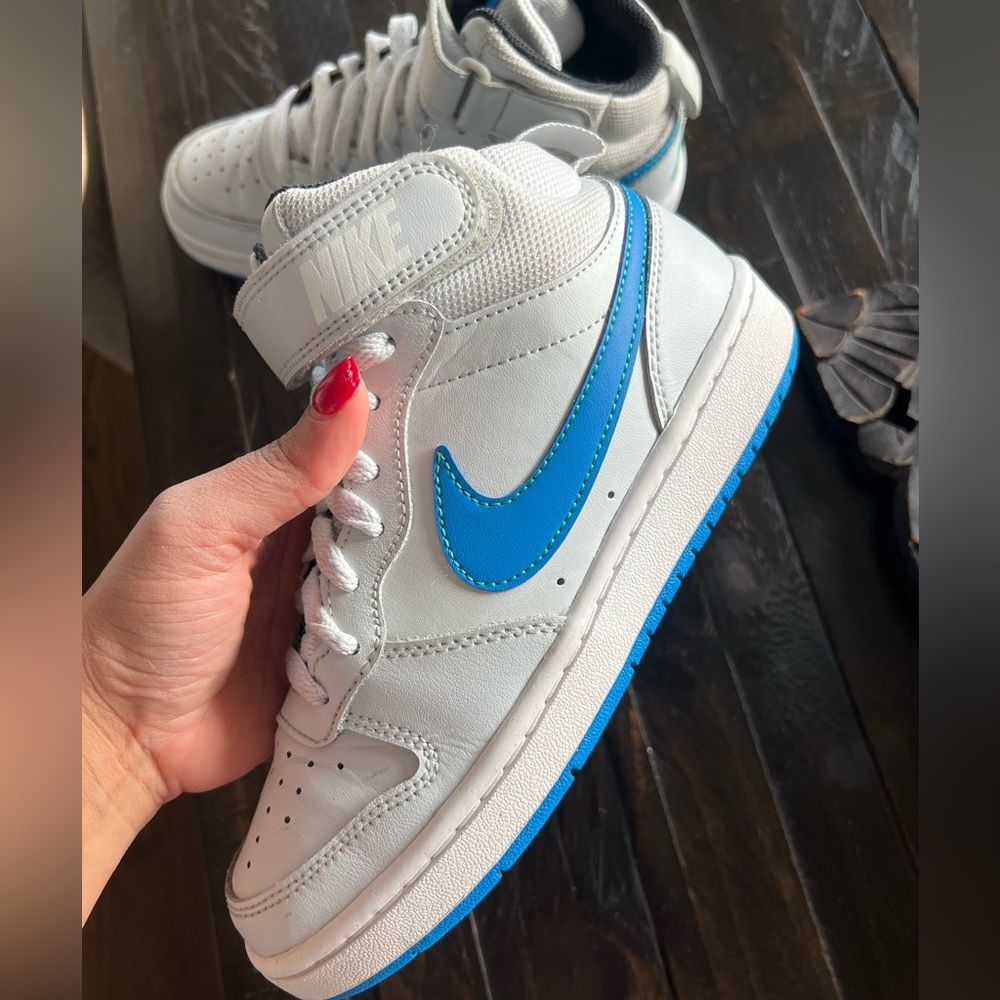 Light grey and blue Nike kids